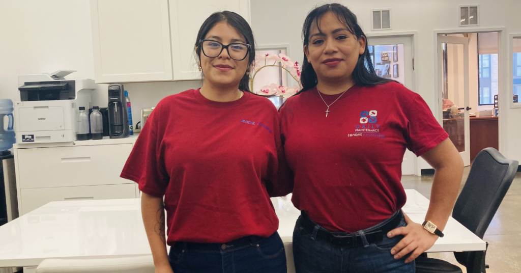 Nataly and Mary Luz, two professional cleaners from Cleaning Concierge smiling at the camera, representing the dedicated team behind residential and commercial cleaning services.